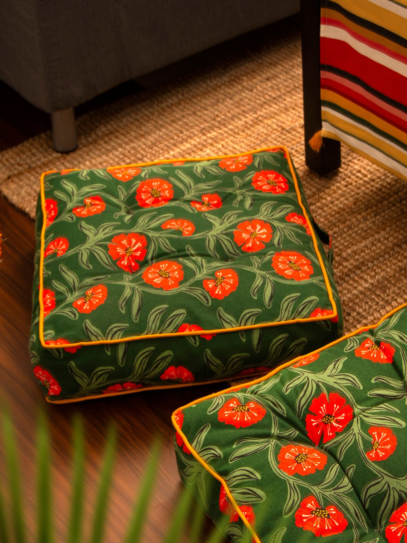 A floral pattern AROMATISK floor cushion