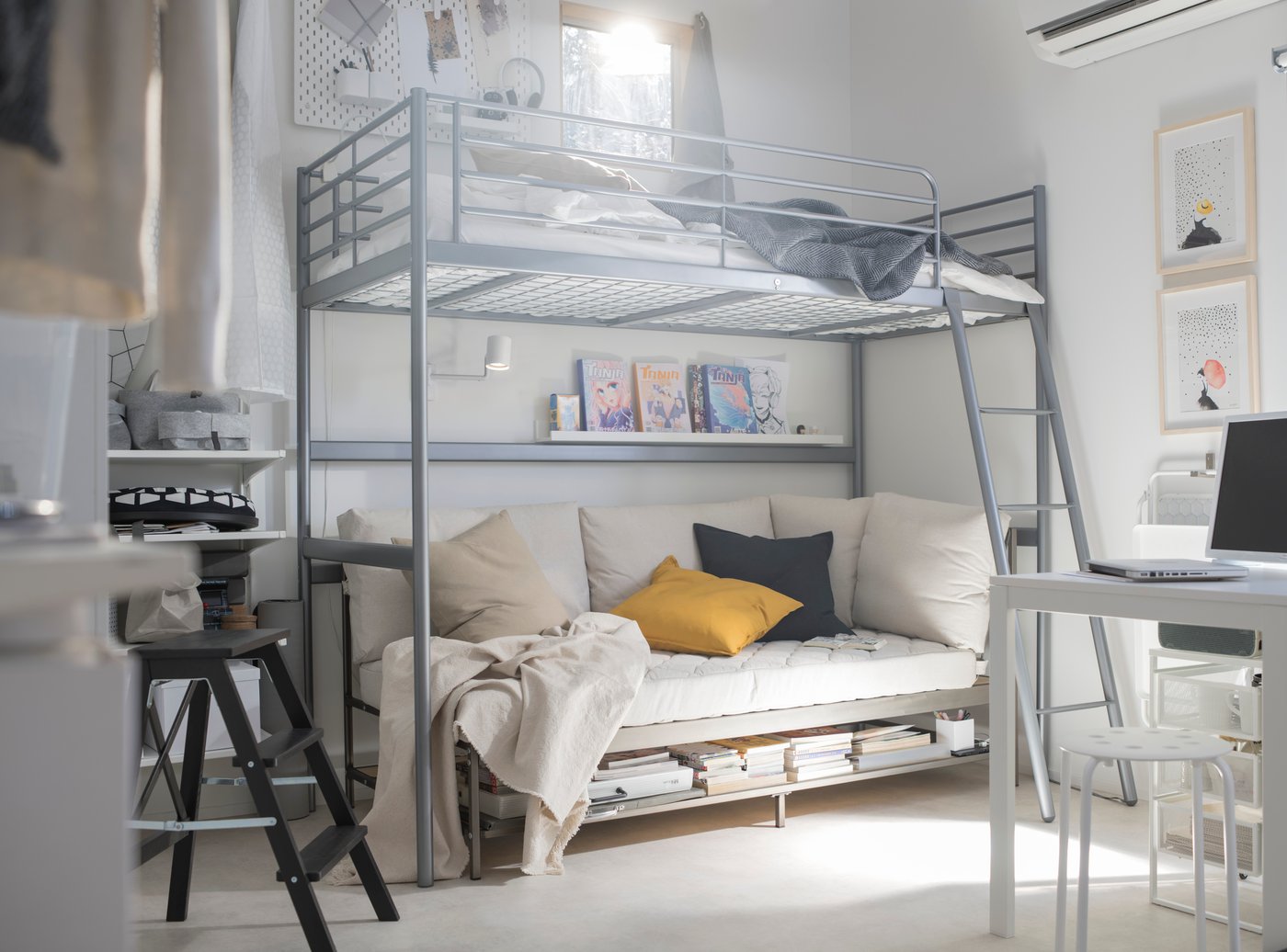 A silver-colour SVÄRTA loft bed frame