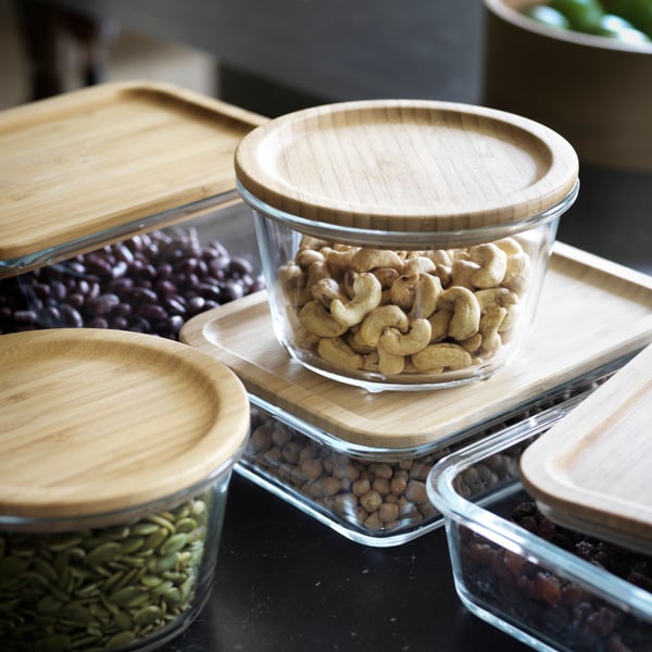 A rectangular glass/bamboo IKEA 365+ food container with lid in the kitchen