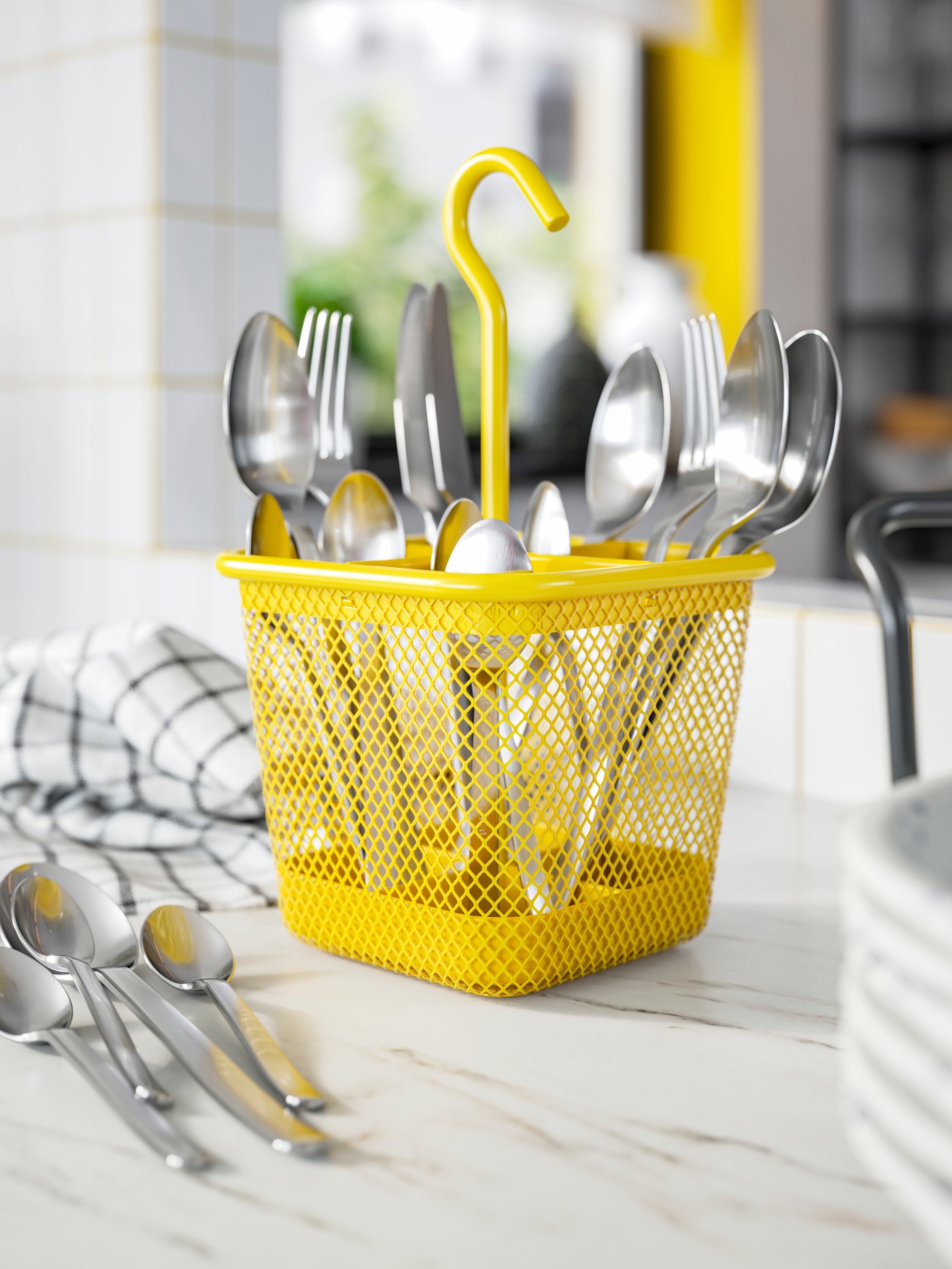 A patterned/blue SILVERSIDA plate in the kitchen