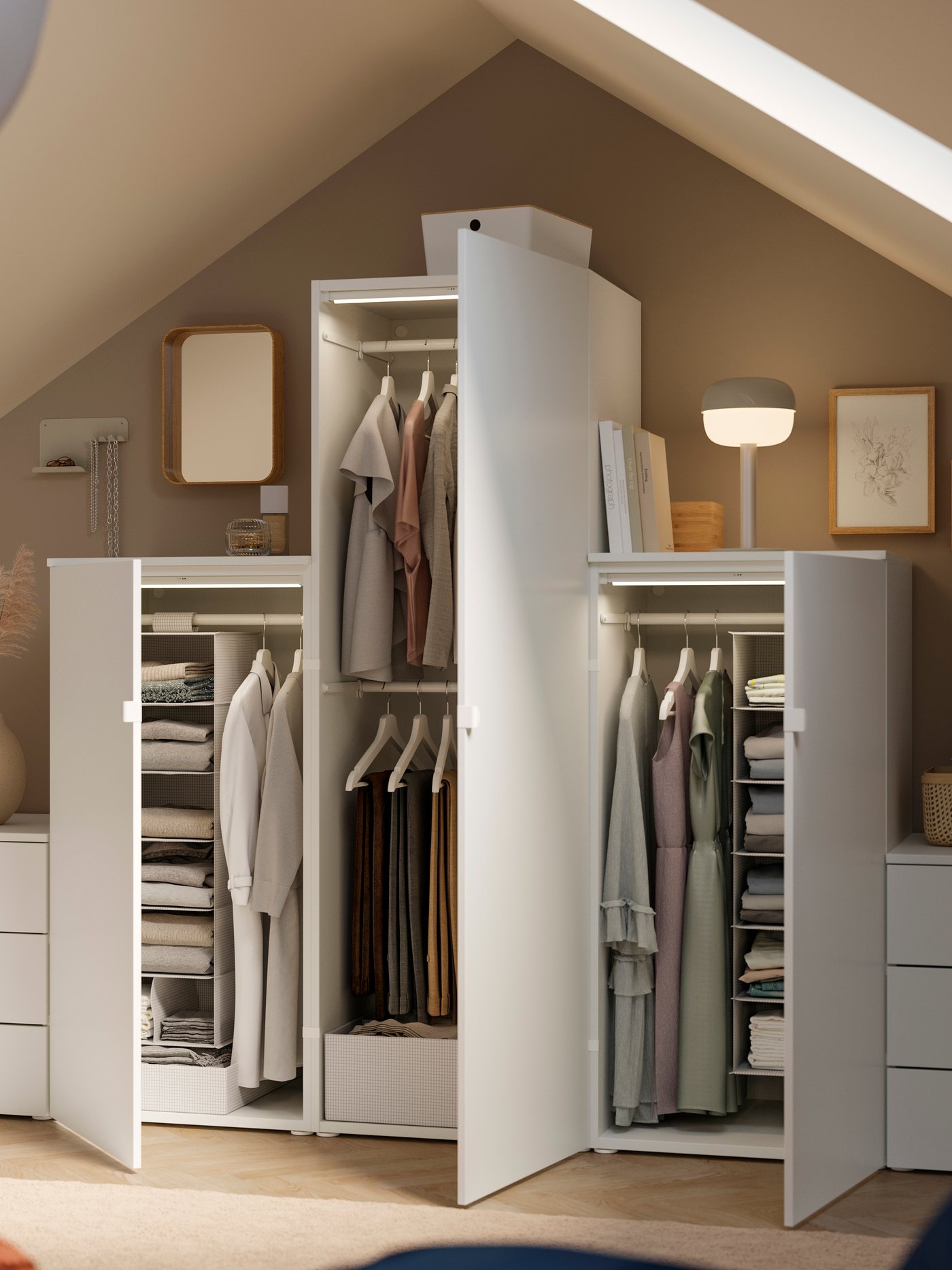 A white/Fonnes white PLATSA wardrobe with 3 doors+6 drawers in the bedroom