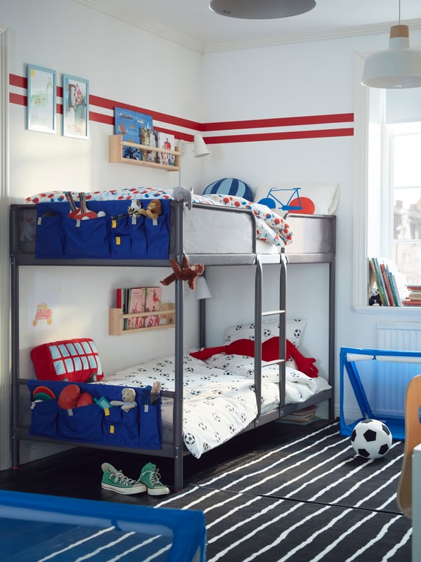 A dark grey TUFFING bunk bed frame in the childrens room