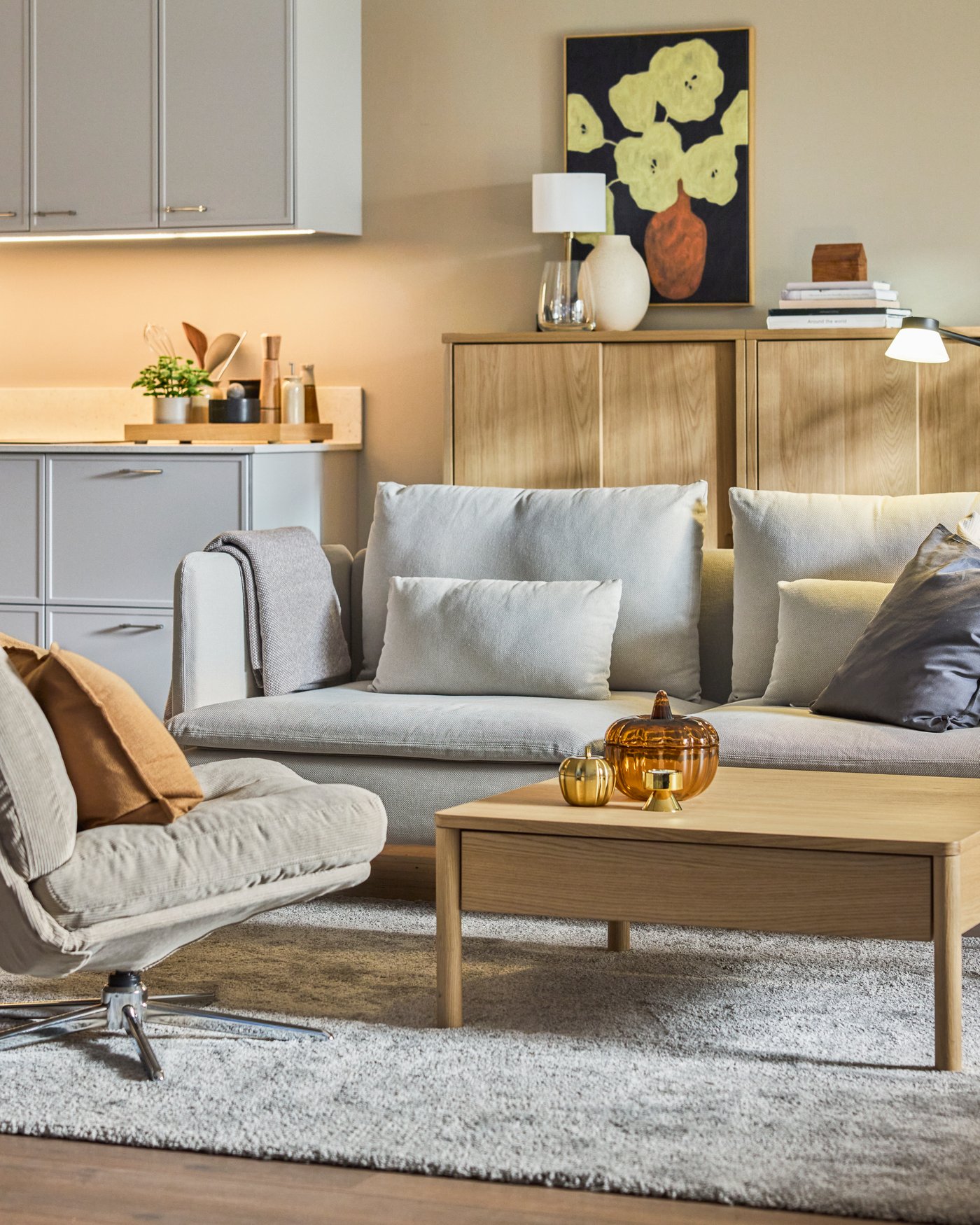 A Kelinge beige DYVLINGE swivel easy chair in the living room