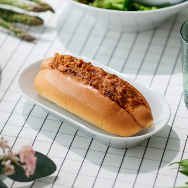Hot dog with chili con carne topping