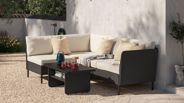 An outdoor plastic rattan dark grey/Frösön/Duvholmen beige VITTSKÄR 3-seat modular corner sofa outside