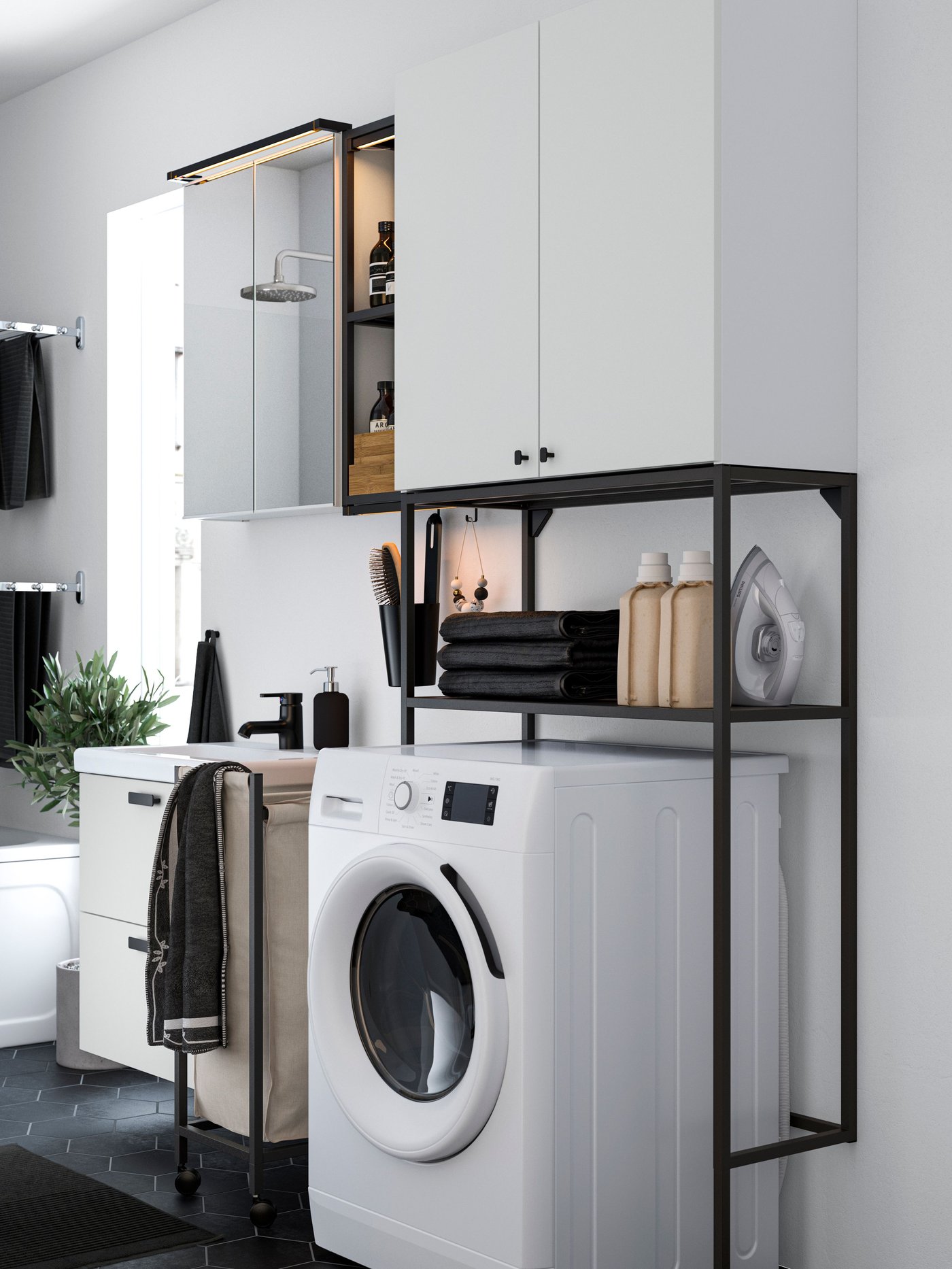 IKEA ENHET anthracite/white laundry cabinet on top of a washing machine in the bathroom. 