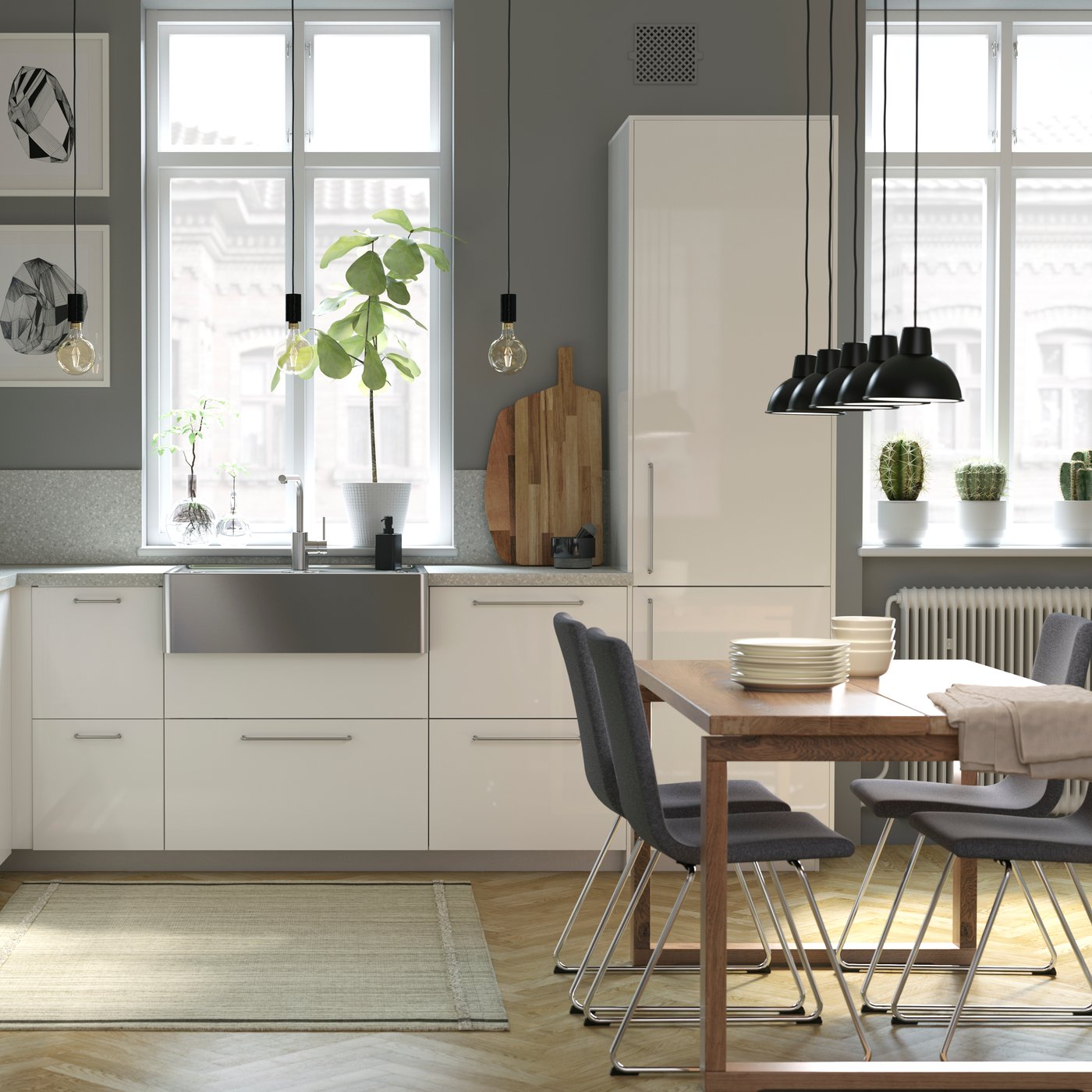 Moderne Küche mit weißen Hochglanzfronten, Edelstahl Spüle und grauen Wänden