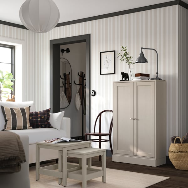 A grey-beige HAVSTA cabinet with plinth