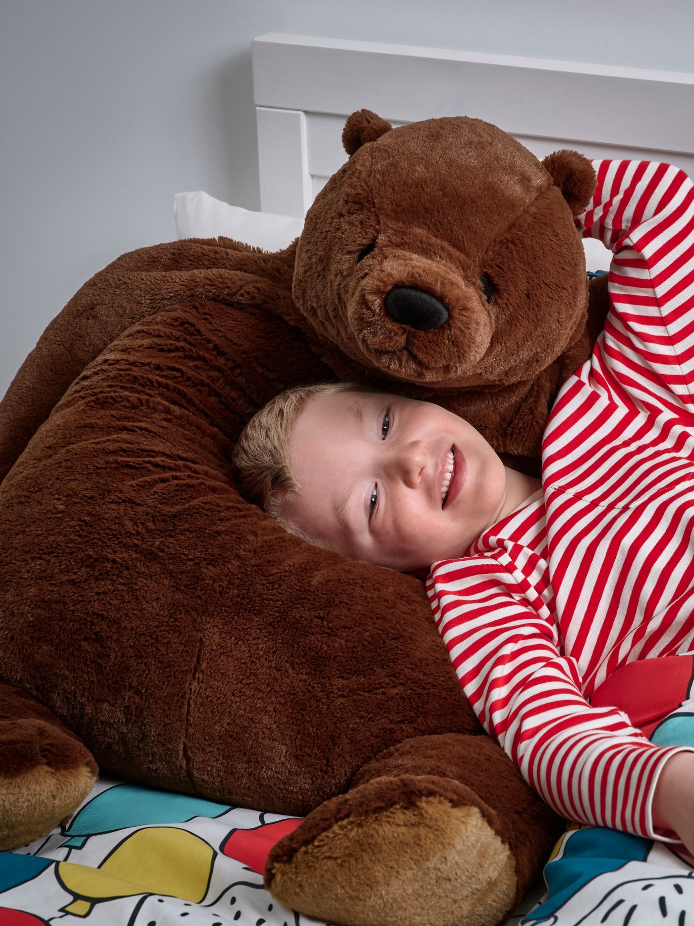 A brown bear DJUNGELSKOG soft toy