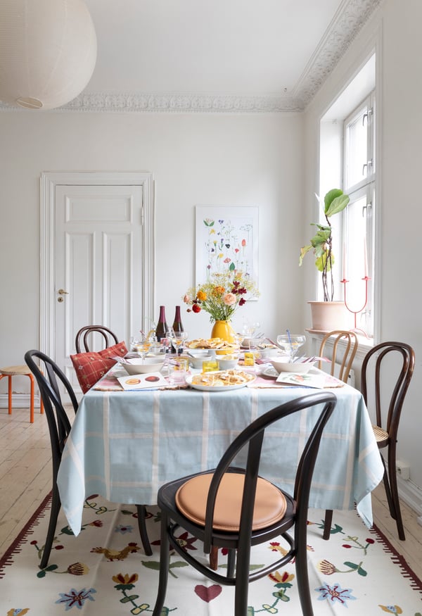 A blue NISSÖGA tablecloth