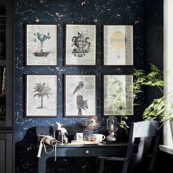 A dark blue-green LOMMARP desk in the living room