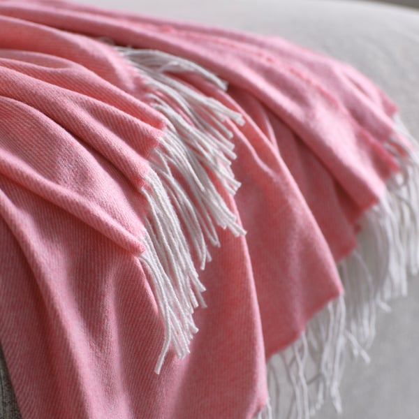 A pink HOLMVI throw
