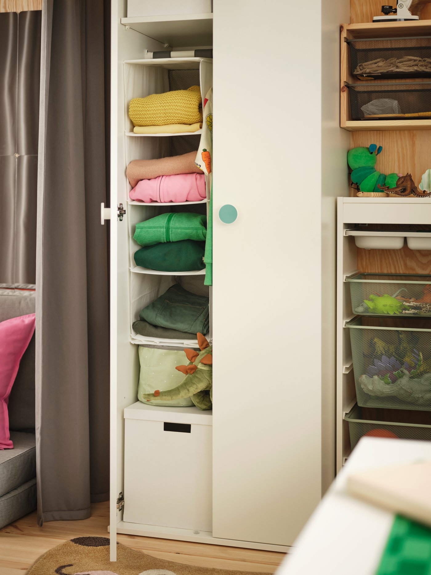 A white RASSLA storage with 5 compartments