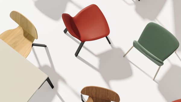 A profiled metal/black-grey SKÅLSTA chair underframe in the dining room