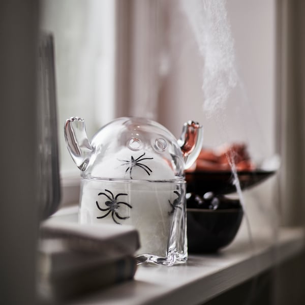 A ghost clear glass KUSTFYR bowl with lid