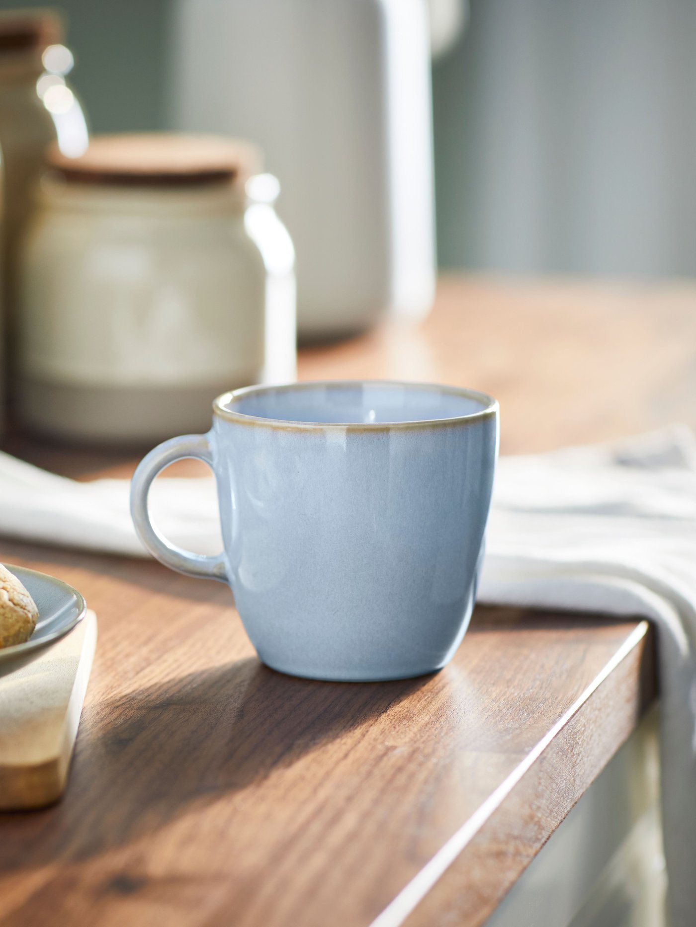 A light blue FÄRGKLAR mug