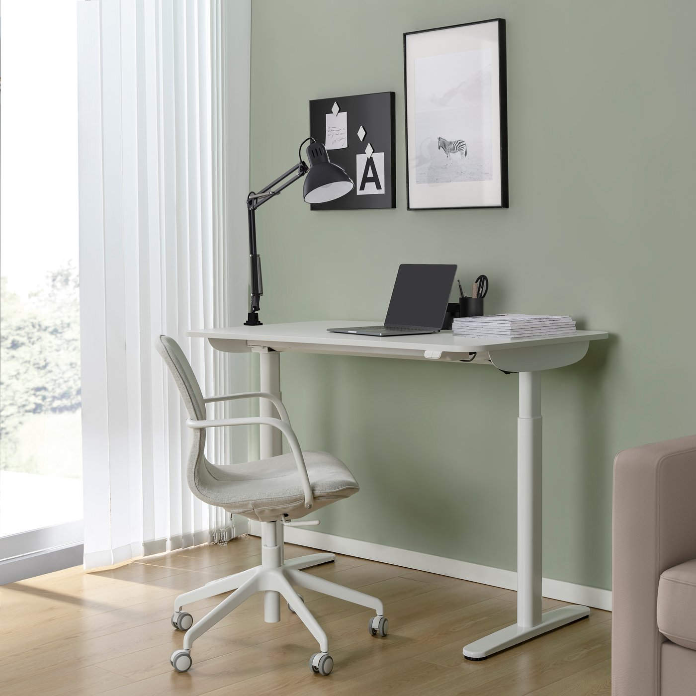 A white BOLLSIDAN desk sit/stand