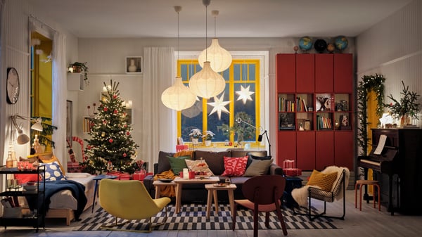 A pine IVAR shelving unit in the living room