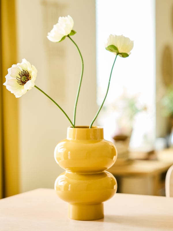 An yellow-beige PÄRLHÄGG vase