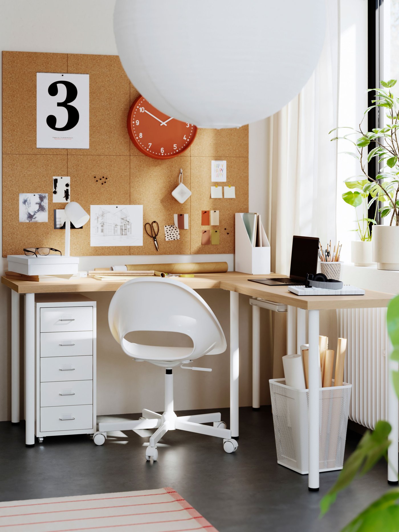 A white stained oak effect/white LAGKAPTEN L-shaped desk in the home office
