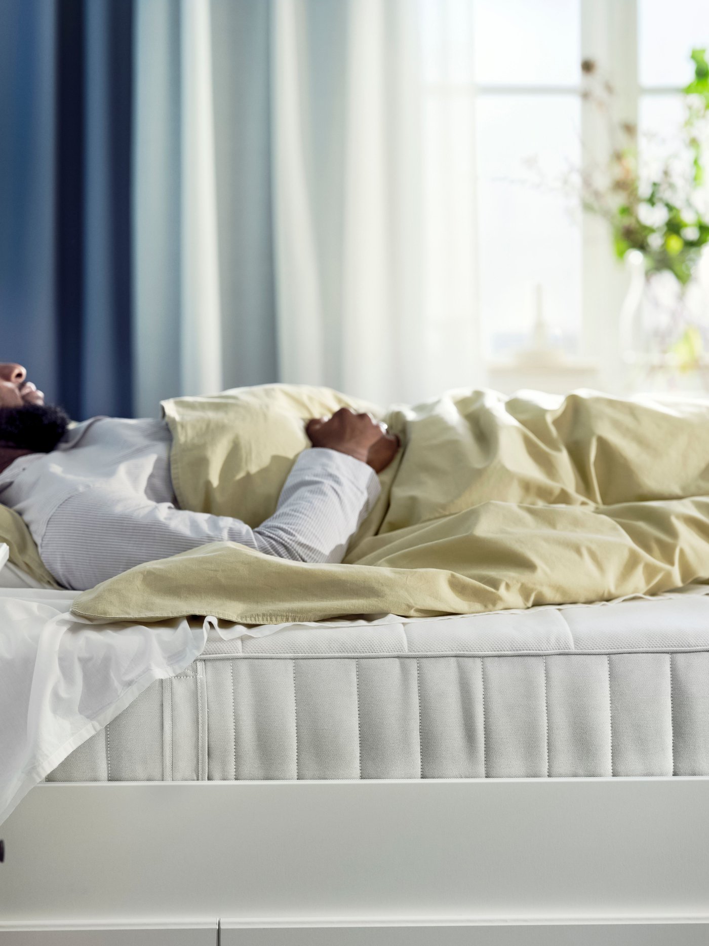 A medium firm/white VESTERÖY hybrid mattress