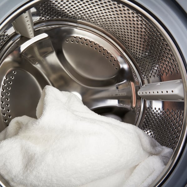 A white towel in washing machine