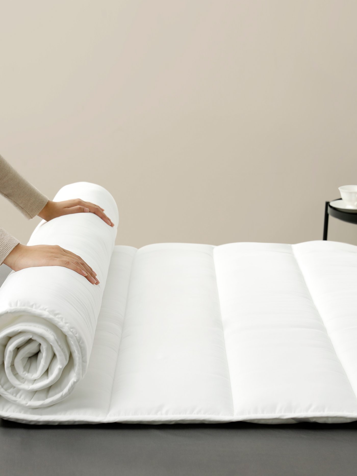 A white BRUKSVARA mattress pad