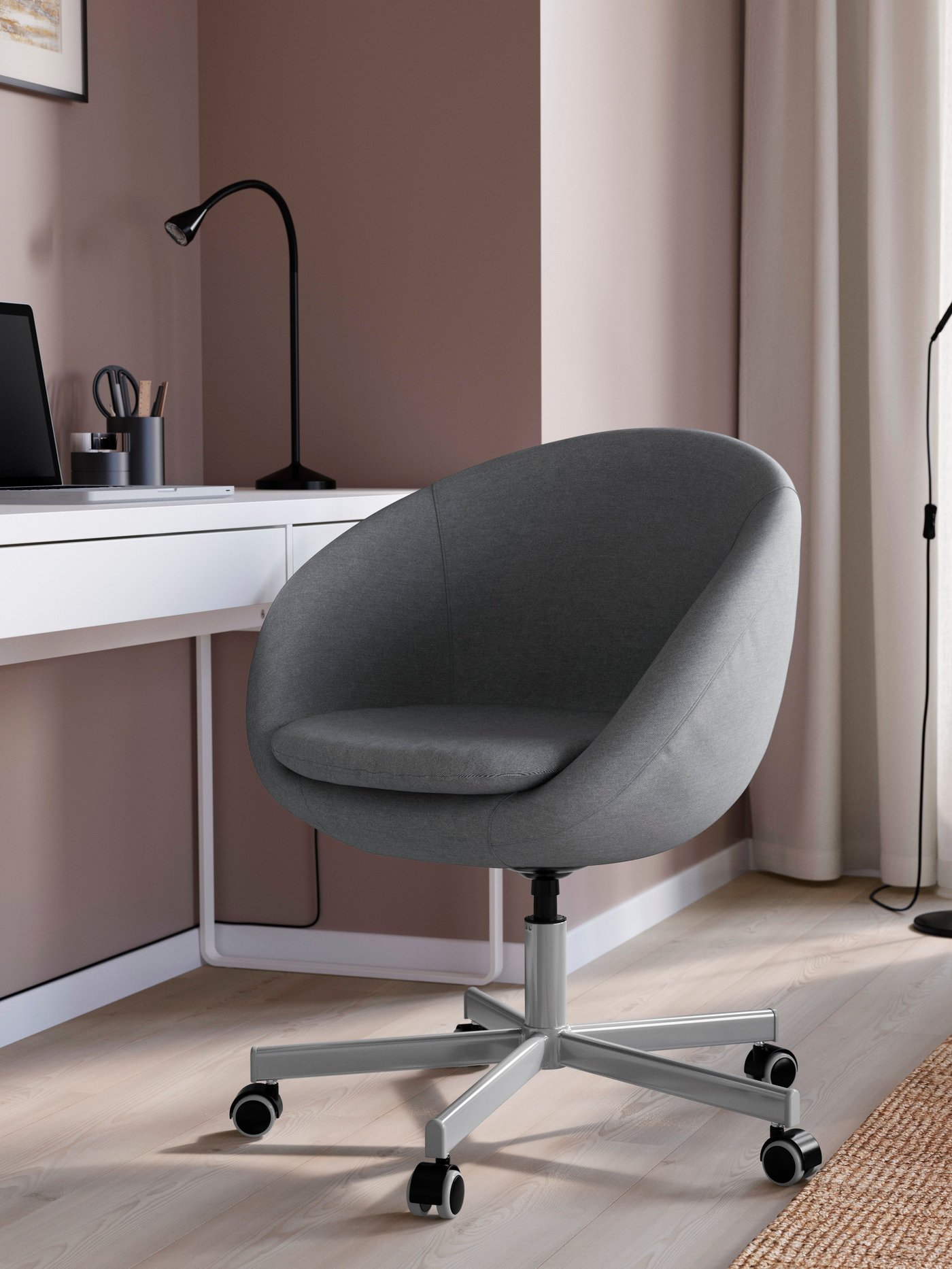 A Vissle grey SKRUVSTA swivel chair