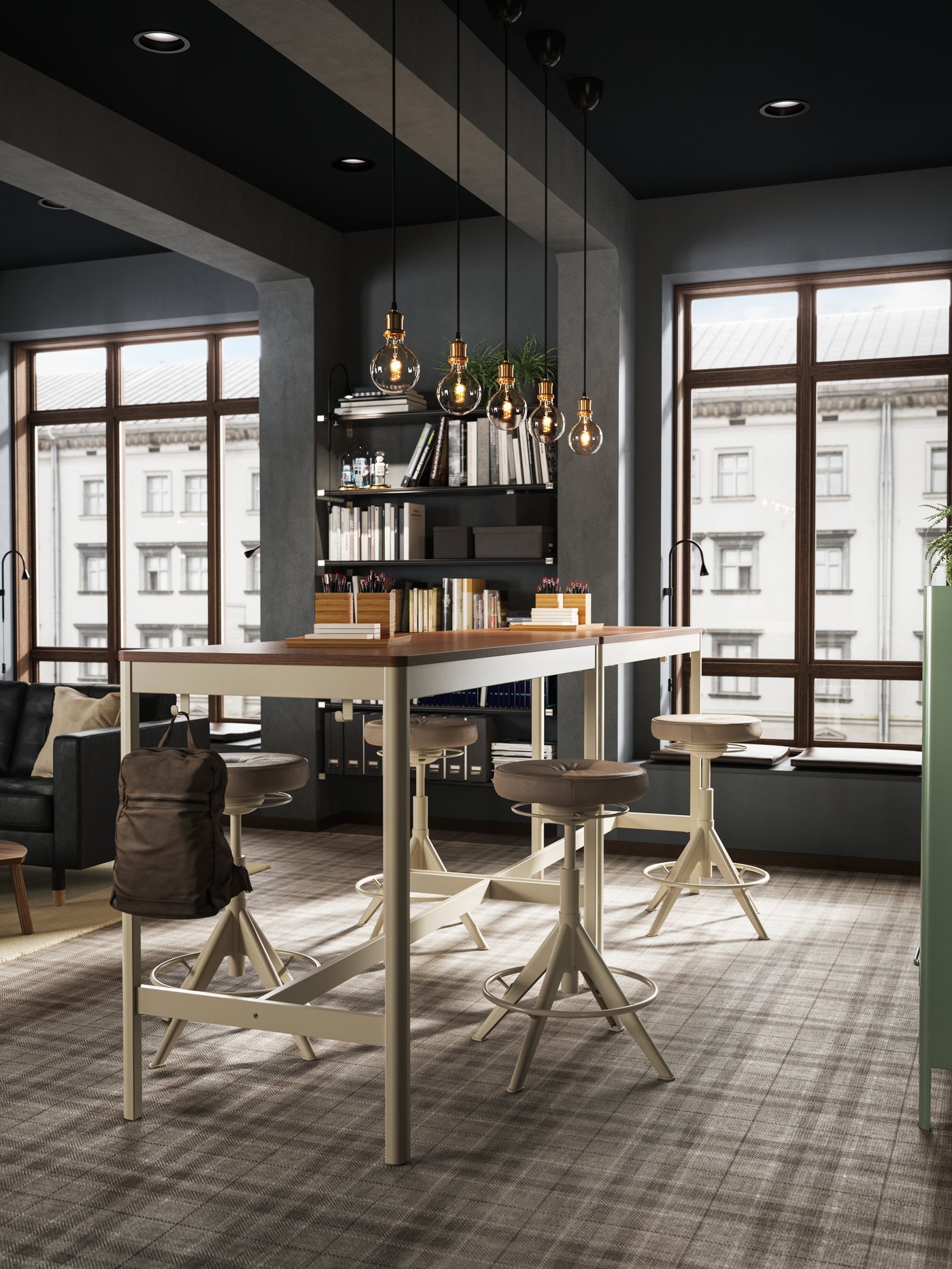 Two high IDÅSEN brown/beige tables placed close to a large window creating a standing meeting zone.