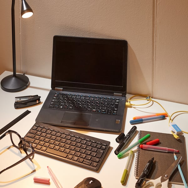 A white ELLOVEN monitor stand with drawer