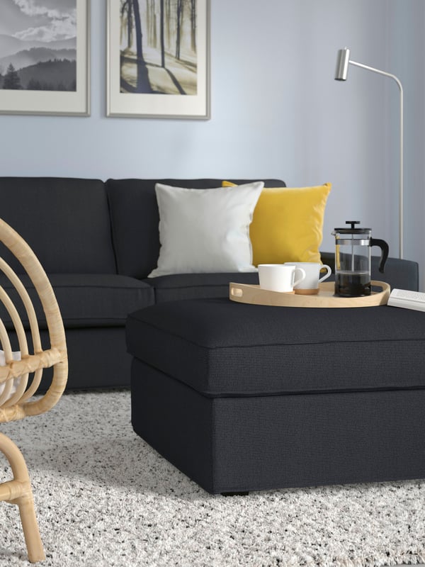 A Tresund anthracite KIVIK footstool with storage