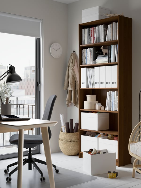 A brown walnut effect BILLY bookcase in the home office