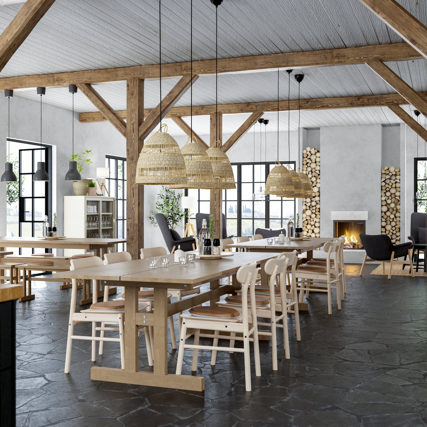 A lodge-style restaurant with long wooden tables, wooden chairs, exposed wooden beams and a fireplace.