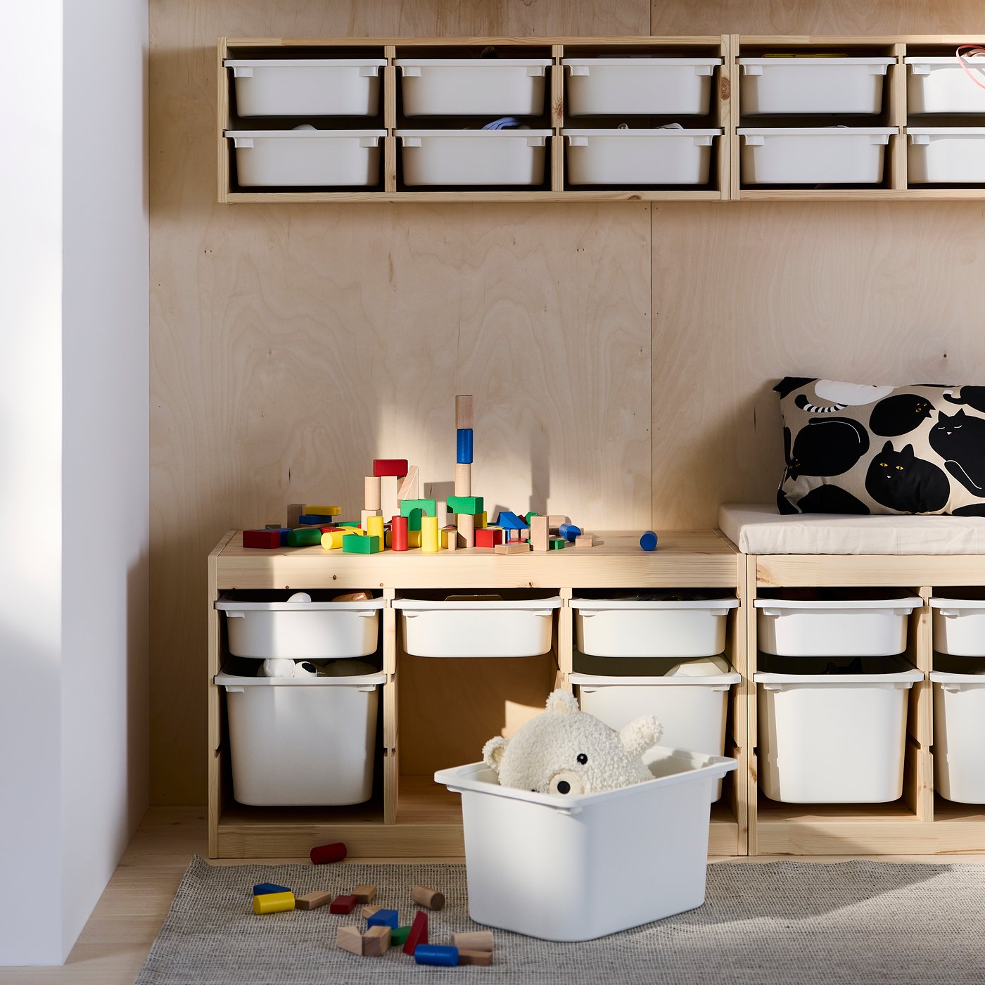 A light white stained pine/white TROFAST storage combination with boxes