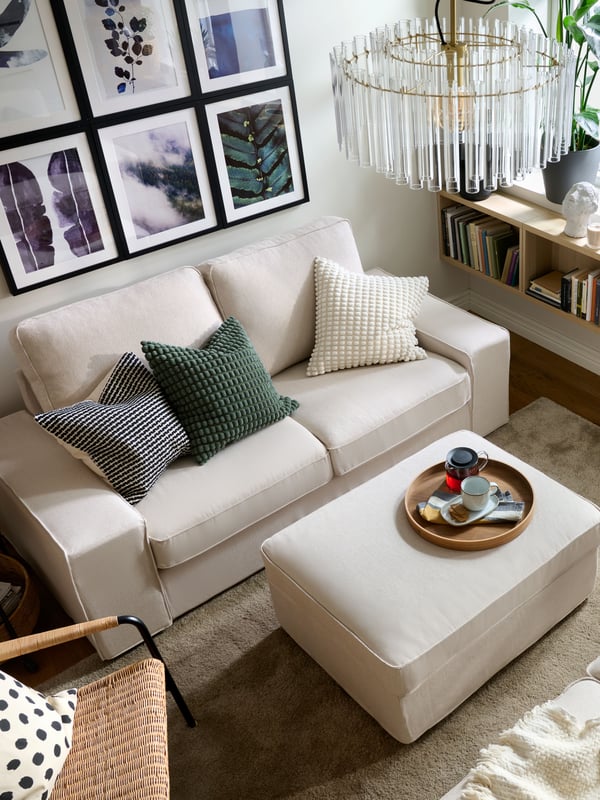 An off-white/dot pattern black ODDNY cushion cover in the living room