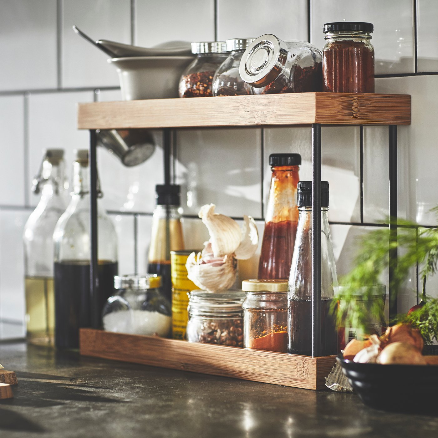 A metal/bamboo NÅLBLECKA kitchen countertop organiser