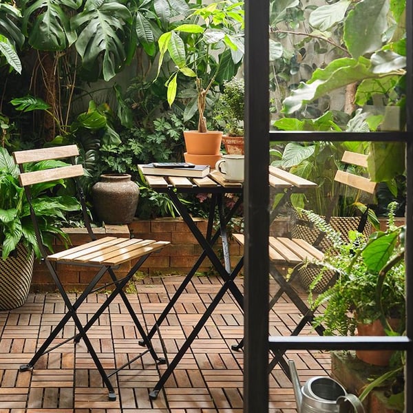 A black/light brown stained TÄRNÖ table, outdoor outside