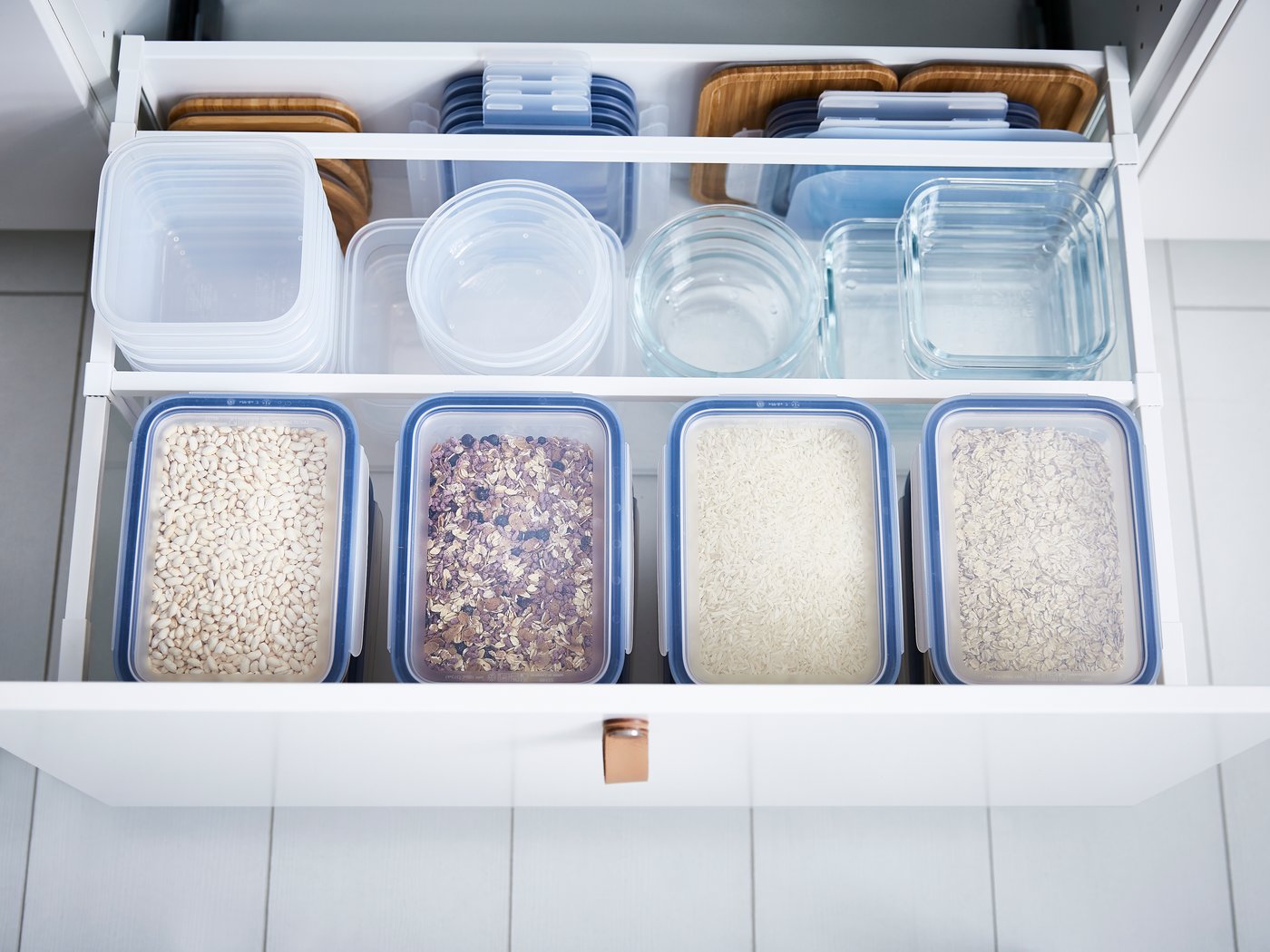 A rectangular/plastic IKEA 365+ food container in the kitchen