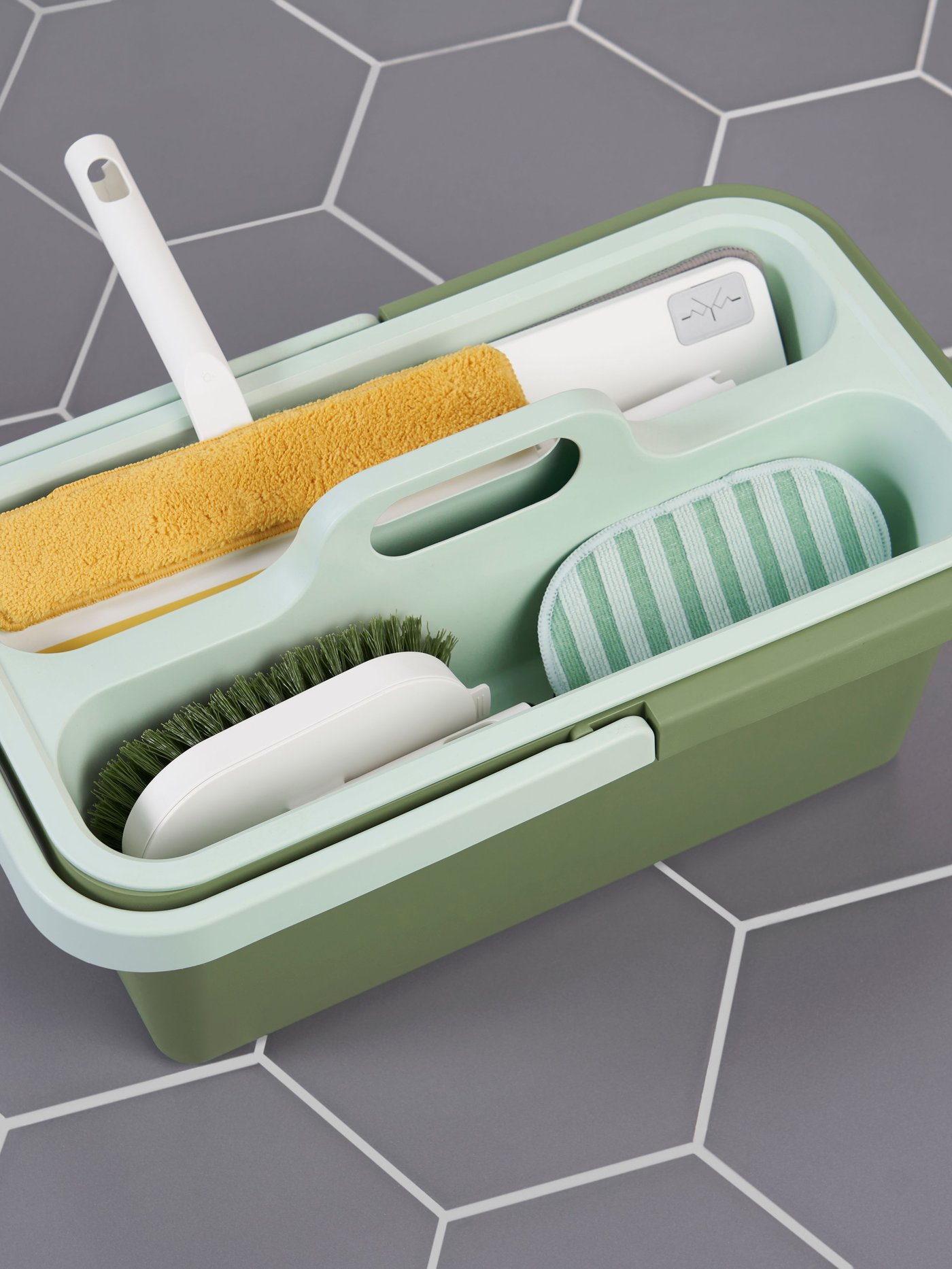 IKEA PEPPRIG green cleaning bucket and caddy on a bathroom floor