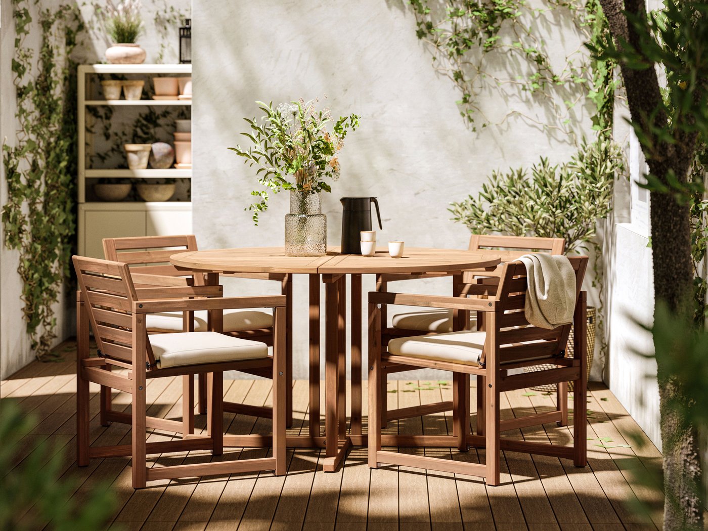 A light brown stained NÄMMARÖ table, outdoor.