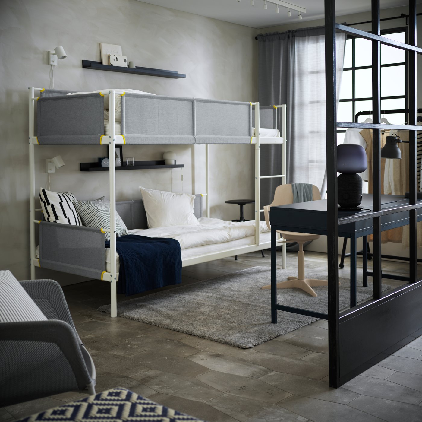 A white/beige ODGER swivel chair in the bedroom