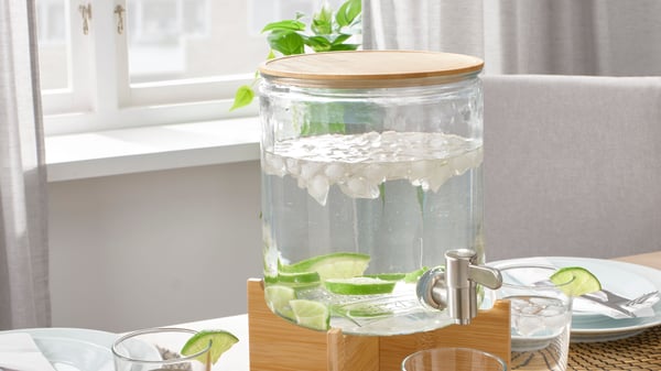 A bamboo/clear glass IKEA 365+ jar with tap