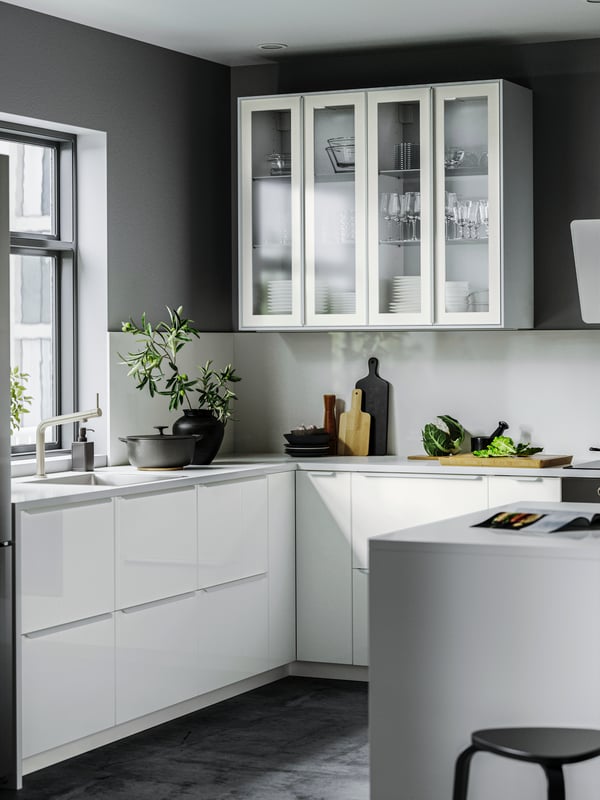 A high-gloss white/laminate SIBBARP custom made wall panel