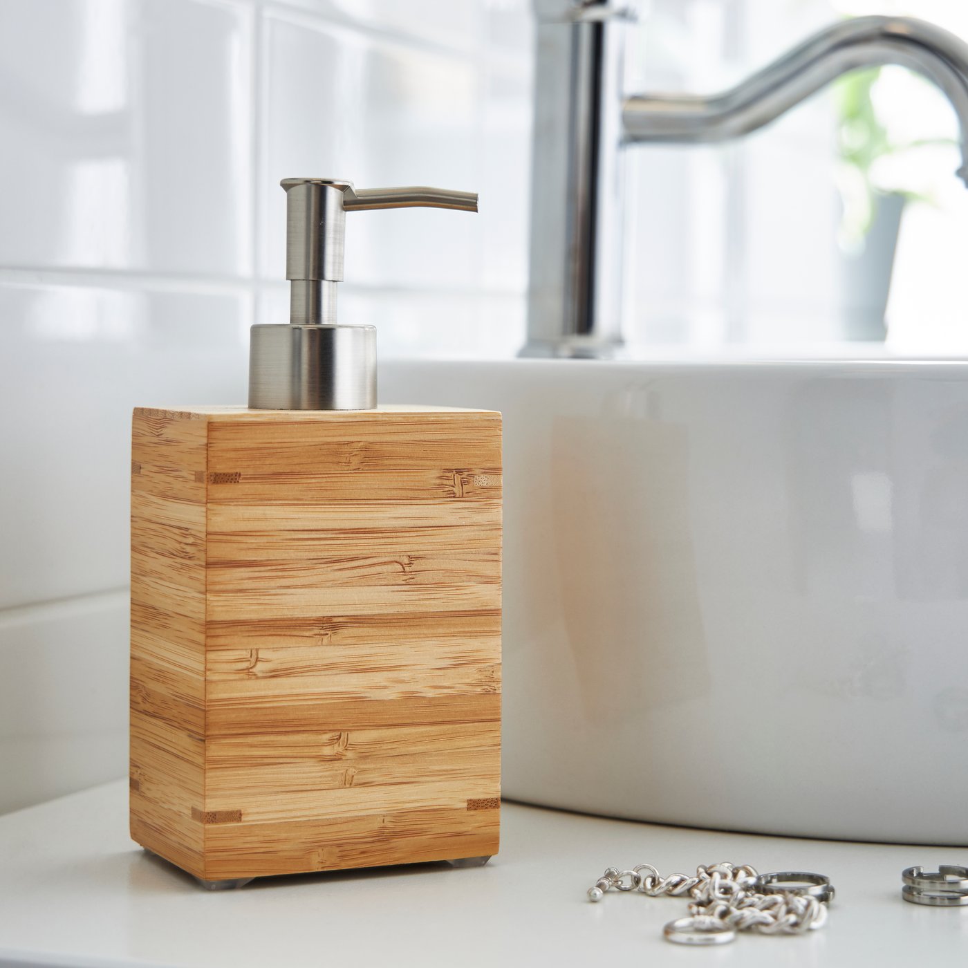 A bamboo DRAGAN soap dispenser in the NA