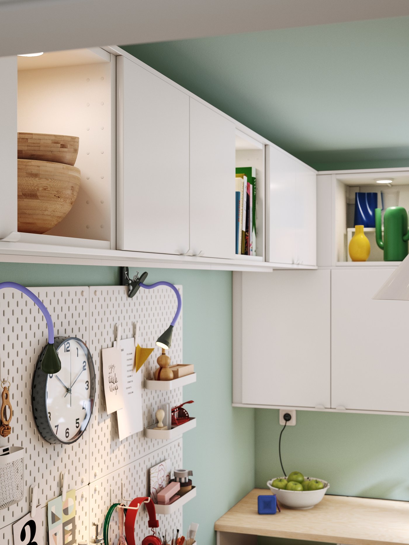 A stylish kitchen featuring white VEDDINGE doors, complemented by decorative objects on shelves and a pegboard with hooks.