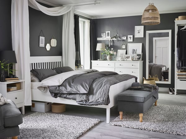 A white IDANÄS bed frame in the bedroom