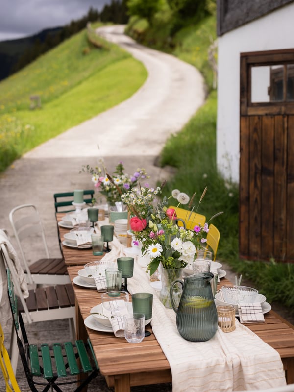 A light brown stained NÄMMARÖ table, outdoor