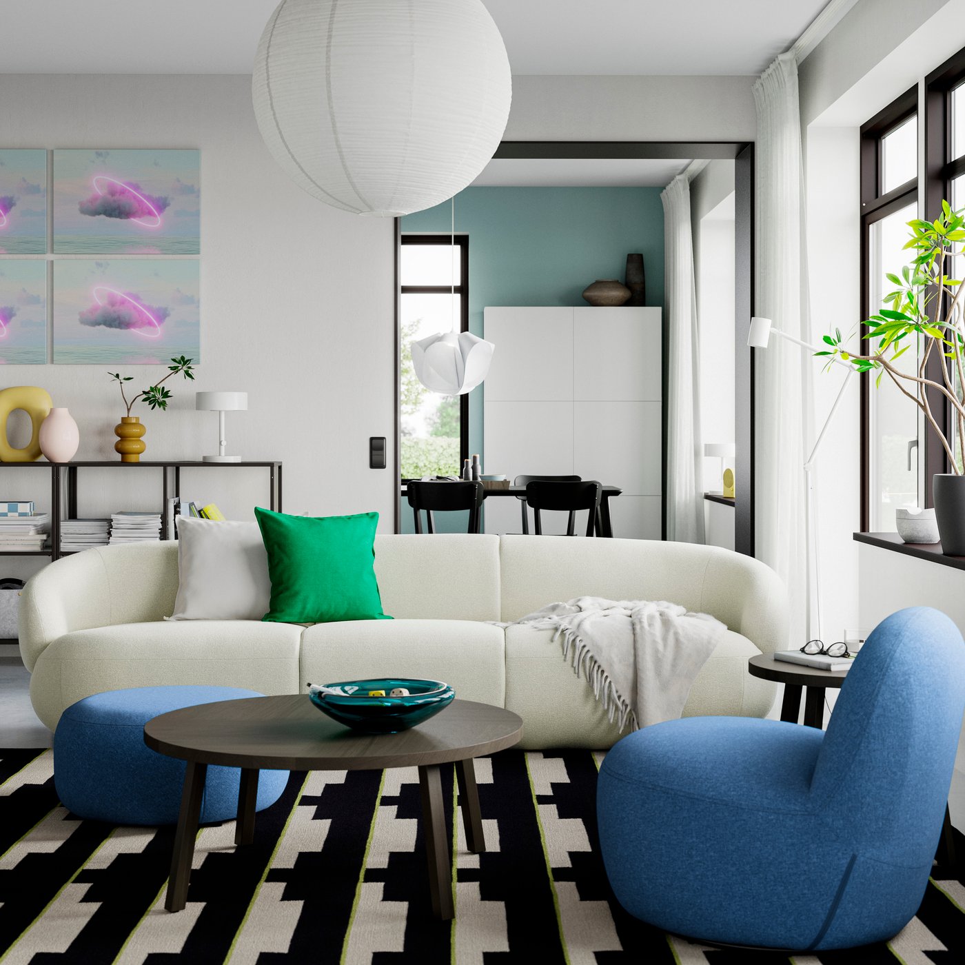 A dark blue LILLESÄTER swivel easy chair stands opposite an off-white LILLESÄTER 4-seat sofa in a bright room.