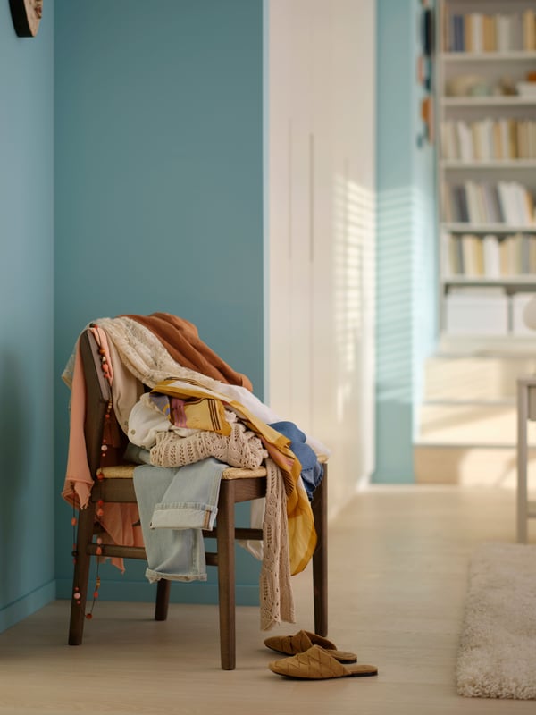 A white BILLY bookcase in the hallway