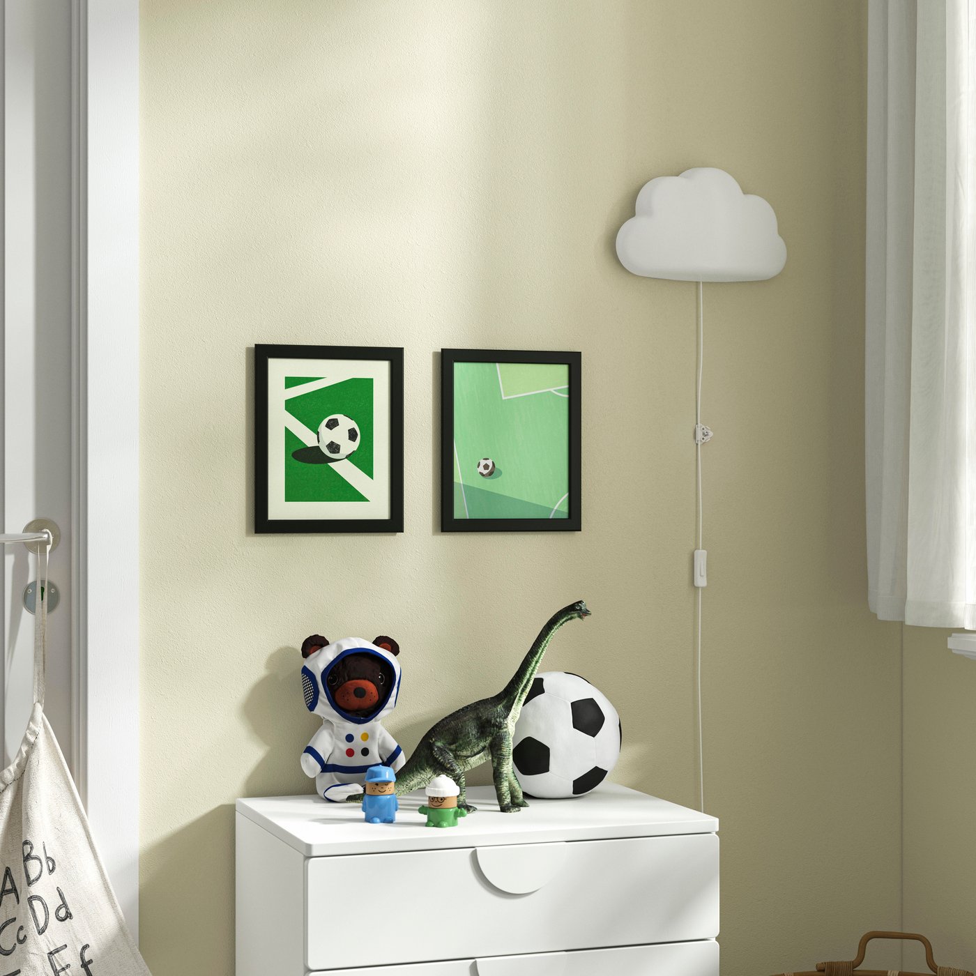 A bear AFTONSPARV soft toy with astronaut suit